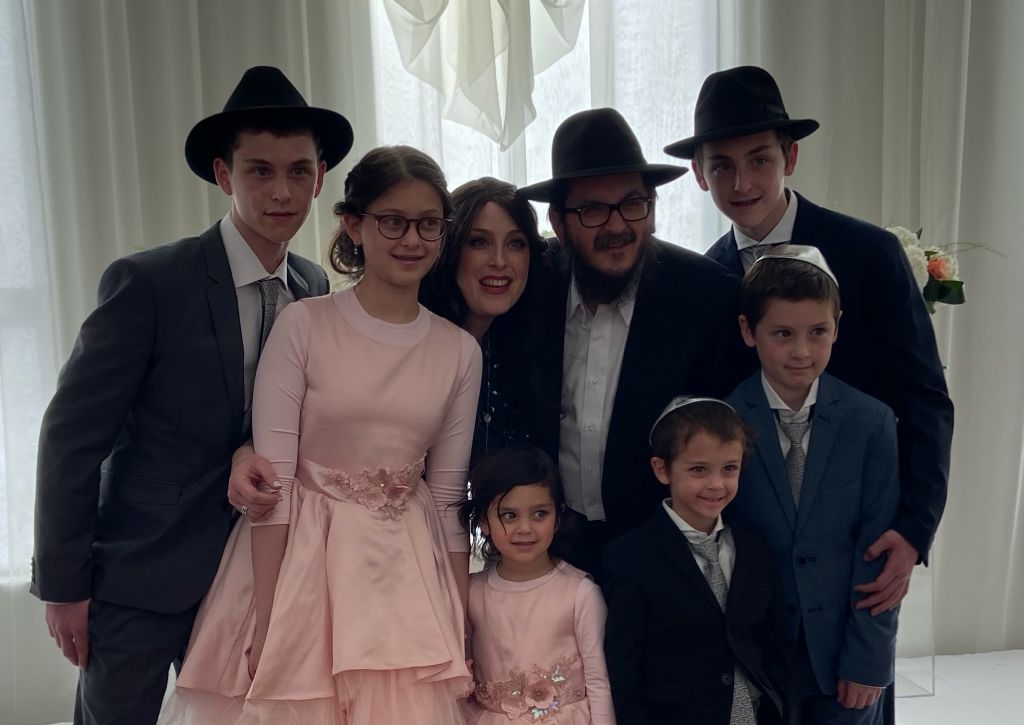 Rabbi Tzvi and Rivky Bronchtain with their family